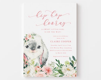 May include: A baby shower invitation with a watercolor illustration of a bunny wearing a floral crown. The text reads "hip hop hooray" and "A sweet little girl is on the way!"  The invitation includes details for the event, including the date, time, location, and RSVP information.