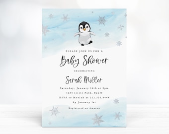 May include: A blue and white baby shower invitation with a penguin illustration and snowflakes. The invitation reads "Please join us for a Baby Shower celebrating Sarah Miller. Saturday, January 14th at 2pm, 1234 Icicle Path, Banff. RSVP to Moriah at 222.333.4444 by January 1st. Registered on Amazon."