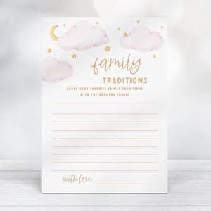 May include: A printable card with a pink and gold design featuring clouds, stars, and a crescent moon. The card says "family traditions" and "share your favorite family traditions with the growing family".