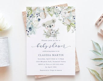 Könnte beinhalten: Eine Babyparty-Einladung mit einer Aquarell-Illustration eines Koalas und Eukalyptusblättern. Die Einladung ist für Claudia Martin und enthält Datum, Uhrzeit, Ort und RSVP-Informationen. Außerdem wird angegeben, dass das Paar bei Target und Amazon registriert ist.
