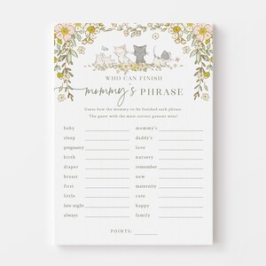 Op de afbeelding: Een printbaar babyshower-spel met een bloemige rand en een schattige illustratie van katten. Het spel heet "Wie kan mama's zin afmaken" en vraagt ​​gasten om te raden hoe de aanstaande moeder elke zin zou afmaken.