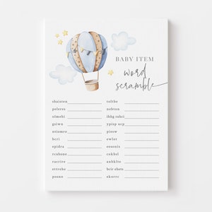 May include: A baby shower game card with a watercolor illustration of a hot air balloon in blue and tan, clouds, and stars. The text "BABY ITEM word scramble" is written in elegant script.