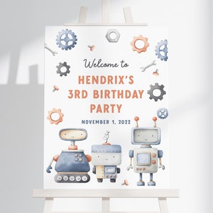 Puede incluir: Un cartel blanco con un tema de robot azul y naranja. El cartel dice "Bienvenido a la fiesta de cumpleaños de Hendrix, 3 años, 1 de noviembre de 2022".