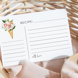 May include: A white recipe card with a floral illustration of pink roses in an ice cream cone. The card has lines for writing a recipe and the words "RECIPE:" and "with love:" printed on it.