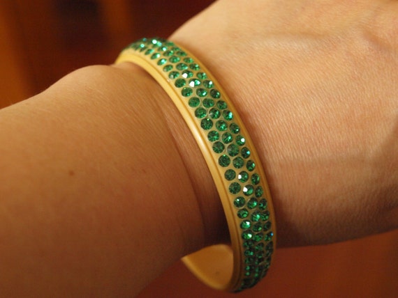 1920's celluloid bangle with green rhinestones