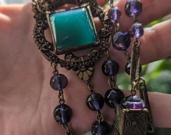 Gorgeous Purple and Green Brass And Glass Czech Necklace Neiger?