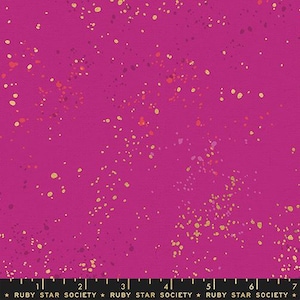 May include: A vibrant magenta fabric with a speckled pattern of gold, orange, and purple dots. The fabric has a textured appearance. The text "RUBY STAR SOCIETY" is printed at the bottom.