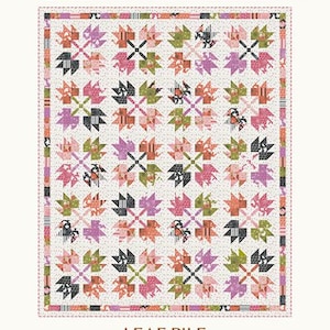 May include: A quilt pattern featuring a repeating leaf design in shades of pink, green, black, and orange on a white background. The quilt is labeled "LEAF PILE" and is designed for runners and throw sizes. The Copper Kettle Quilt Company logo is in the upper left corner.