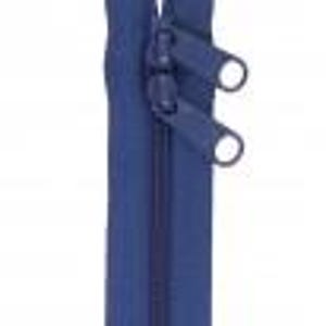 May include: A blue zipper with two metal sliders. The zipper is closed and the sliders are at the top of the zipper.