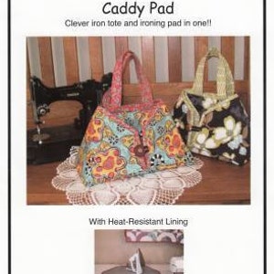 May include: An image of a Caddy Pad, a clever iron tote and ironing pad in one. The tote is teal with a colorful floral pattern. The image also shows a sewing machine and a second tote with a black floral pattern.