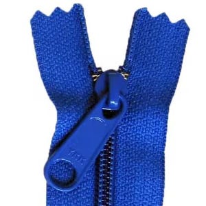 May include: Close-up of a blue zipper with a matching pull tab. The zipper teeth are silver, and the fabric is a vibrant blue. The pull tab has the brand name "YKK" printed on it. This zipper is suitable for various sewing projects.