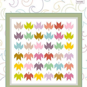 May include: A quilt pattern titled "Leaflets" with a finished size of 68" x 68". The quilt design features a grid of colorful leaf shapes in shades of yellow, pink, orange, green, and purple. The background is white with a green border.