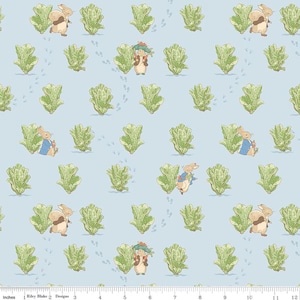 May include: A light blue fabric featuring a repeating pattern of cartoon rabbits, green lettuce, and footprints. The rabbits are depicted in various poses, some wearing blue jackets. The lettuce is a light green color.