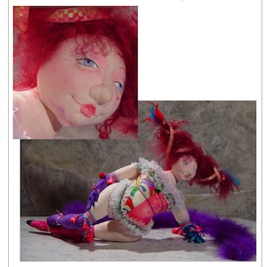 May include: A handmade doll dressed as a Victorian carnival performer. The doll has red hair, a pink and white dress, and a purple feather boa. The doll is posed sitting with one leg extended and the other bent. The doll is titled "Delilah the Fat Lady" and is part of the "Victorian Carnival Series" by Whimsy by Barbara Schoenoff.
