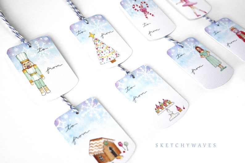 May include: Set of eight watercolor gift tags featuring winter holiday themes. Each tag has a different illustration, including a gingerbread house, a Christmas tree, a nutcracker, a ballerina, a candy cane, a cupcake stand, and a girl in a blue dress. The tags are printed on white cardstock with a blue watercolor background and snowflakes.