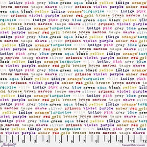 May include: A fabric swatch with a repeating pattern of colorful words on a white background. The words are in various colors, including pink, blue, green, and yellow. A ruler is at the bottom, marked in inches.