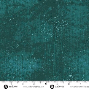 May include: Teal fabric with a textured, distressed appearance. The design features vertical streaks and scattered white speckles, creating a mottled effect. The fabric has a rustic, weathered look, suitable for various craft projects.