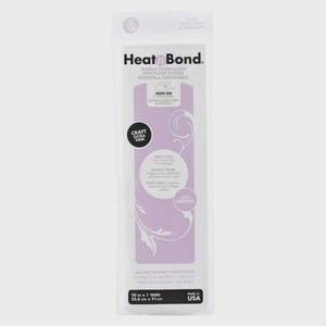 May include: HeatnBond fusible interfacing in a clear package. The package has a purple and white design with the words "Craft Extra Firm" and "Iron-On". The product measures 50.8 cm x 91 cm.