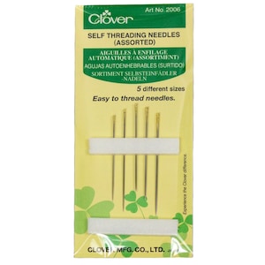 May include: Package of Clover self-threading needles, assorted sizes. The package is yellow with green clover leaves and the text "Self Threading Needles (Assorted)" and "Easy to thread needles."