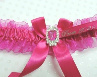 Prom garters. Ivory prom garter wred,ht.pink,fuchsia roses