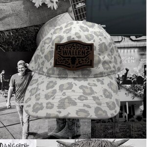 May include: A white and brown leopard print baseball cap with a brown leather patch that says "WALLEN" in black letters. The patch has a small black bull's head design.