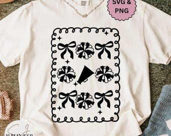 May include: Cream-colored t-shirt featuring a black and white graphic design of bows, pom-poms, and a megaphone within a decorative border. The shirt has a V-neck and short sleeves. The text "SVG & PNG" is in a pink circle.