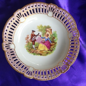 Gorgeous Dresden riticulated, signed bowl.