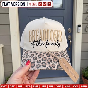 May include: A cream-coloured baseball cap with a leopard print brim. The front features the embroidered text BREADLOSER in gold and of the family in black. A brown tag labelled ShopArchersArrow is attached. Text indicates 4, 5, and 6 inch sizes.