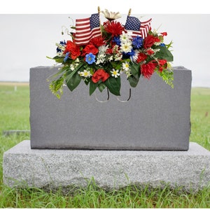 Cemetery graveside flower arrangement, headstone memorial arrangement, patriotic veteran USA headstone saddle.