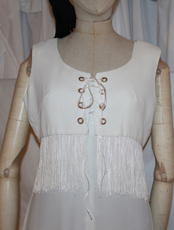 cher white jumpsuit