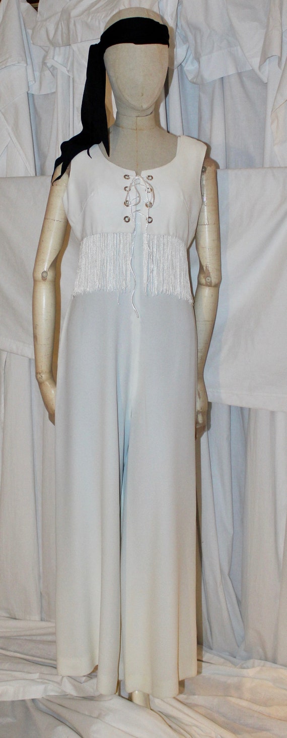cher white jumpsuit