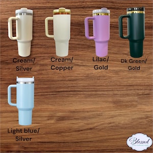 May include: A collection of insulated tumblers in various colors, including cream, lilac, dark green, and light blue. Each tumbler has a handle and a lid. The tumblers are labeled with their color and accent metal, such as silver, gold, and copper.