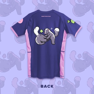 May include: Navy blue athletic shirt with pink accents and a cartoon skunk graphic. The shirt features the text "SWEATY ROLLS CLUB" and "BACK". The skunk graphic shows two skunks hugging. The shirt has short sleeves.
