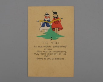 May include: A vintage Christmas card with a green Christmas tree and two children holding yellow ribbons. The card reads "TO YOU All that "MERRY CHRISTMAS" means May you be possessing, May each moment of the DAY Bring to you a blessing."