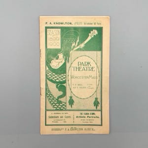 May include: A green and white programme for the Park Theatre in Worcester, Massachusetts. The programme is for the 1899-1900 season. The programme features an illustration of a woman playing a lute.