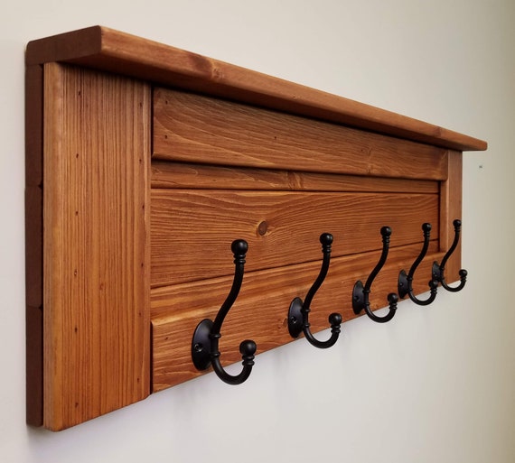 wall cabinet with coat hooks