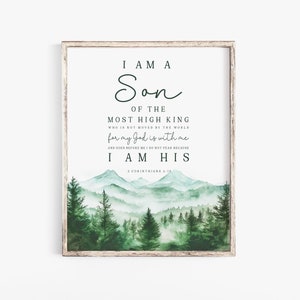 May include: A watercolour painting of a forest with mountains in the background. The text "I AM A Son OF THE MOST HIGH KING WHO IS NOT MOVED BY THE WORLD for my God is with me AND GOUS BEFORE WE DO NOT FEAR BECAUSE I AM HIS 2 CORINTHIANS 6:17" is written on the print.