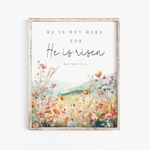 May include: A watercolor print with a floral design and the text "He is not here: for He is risen. Matthew 28:6"