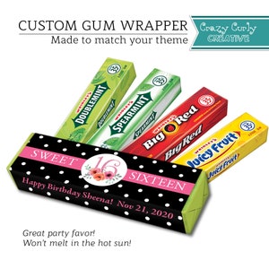May include: A black and white polka dot wrapper with the words "Sweet Sixteen" and "Happy Birthday Sheena! Nov 21, 2020" printed on it. The wrapper is wrapped around a pack of chewing gum. The gum is in a variety of flavors, including Doublemint, Spearmint, Big Red, and Juicy Fruit.