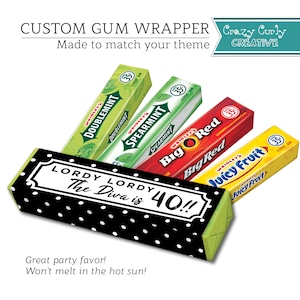 May include: A black and white polka dot gum wrapper with the text "LORDY LORDY The Diva is 40!!"  The wrapper is folded around a pack of gum. The gum is a variety pack of Doublemint, Spearmint, Big Red, and Juicy Fruit.