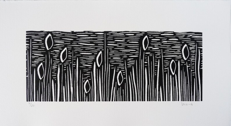 May include: Black and white woodcut print of a field of tall grass with rounded shapes at the top. The print is numbered 8/50 and signed "Dec-16".