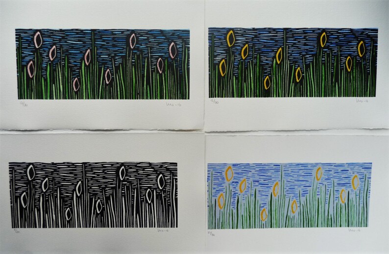 May include: Four different color variations of a woodblock print depicting a field of green grass with yellow and pink flowers against a blue sky.