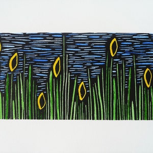 May include: A black and white print of a landscape with yellow flowers and green grass. The print is signed "Wlo - 16" and numbered "12/50".