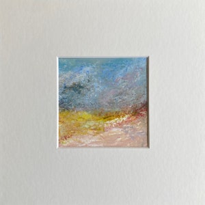May include: Abstract painting with a blue, yellow, and pink colour scheme. The painting has a textured surface and a soft, dreamy feel.