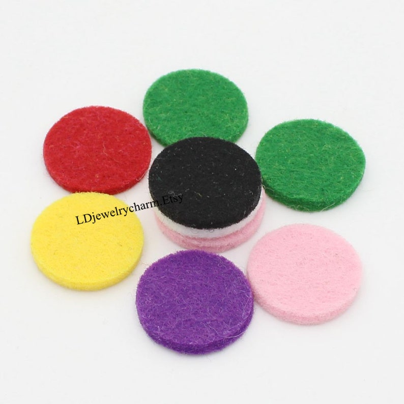 May include: Assortment of felt circles in various colors, including red, green, yellow, black, purple, and pink. These circles are ideal for crafting and DIY projects.