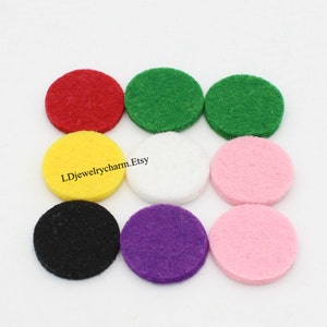 May include: Ten round felt pads in various colors, including red, green, yellow, white, black, purple, and pink.  LDjewelrycharm.Etsy