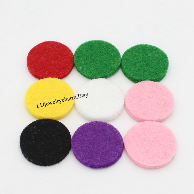 May include: Ten round felt pads in various colors, including red, green, yellow, white, black, purple, and pink.  LDjewelrycharm.Etsy