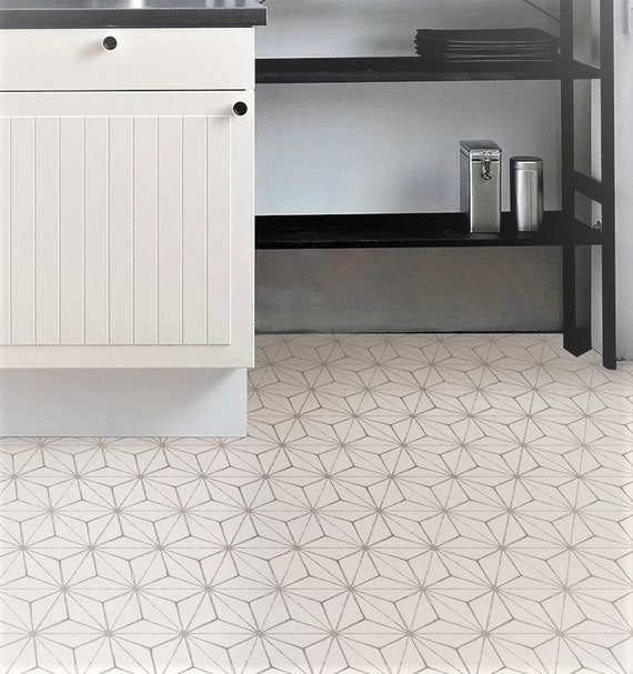 Vinyl stick 2024 on floor tiles