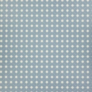 May include: A light blue fabric with a repeating pattern of white floral shapes and connecting lines. The design creates a grid-like appearance, suitable for various craft projects or home decor.
