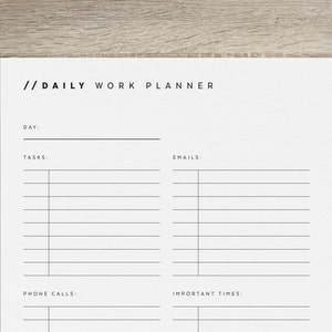 May include: A printable daily work planner with sections for tasks, emails, phone calls, and important times. The planner has a simple black and white design.
